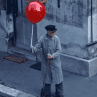 Man Holding Balloon