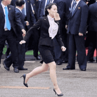 Kim Yo-Jong running with bread